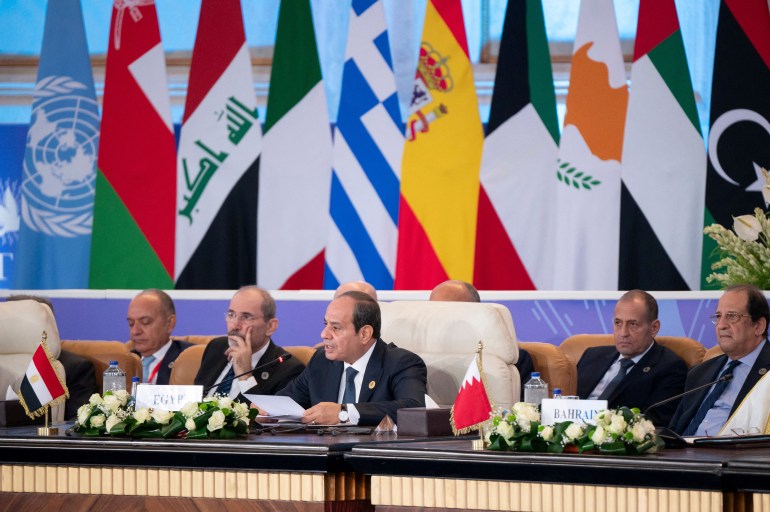 Egyptian President Abdel Fattah El Sisi presents a speech during the Cairo Summit for Peace, at the St. Regis in. Cairo, Egypt, October 21, 2023. UAE Presidential Court/ Abdulla Al Neyadi/ Handout via REUTERS THIS IMAGE HAS BEEN SUPPLIED BY A THIRD PARTY