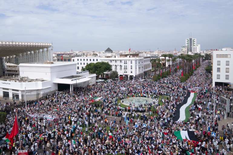Thousands of Moroccans take part in a protest in solidarity with Palestinians in Gaza, in Rabat, Morocco, Sunday, Oct. 15, 2023. (AP Photo/Mosa'ab Elshamy)
