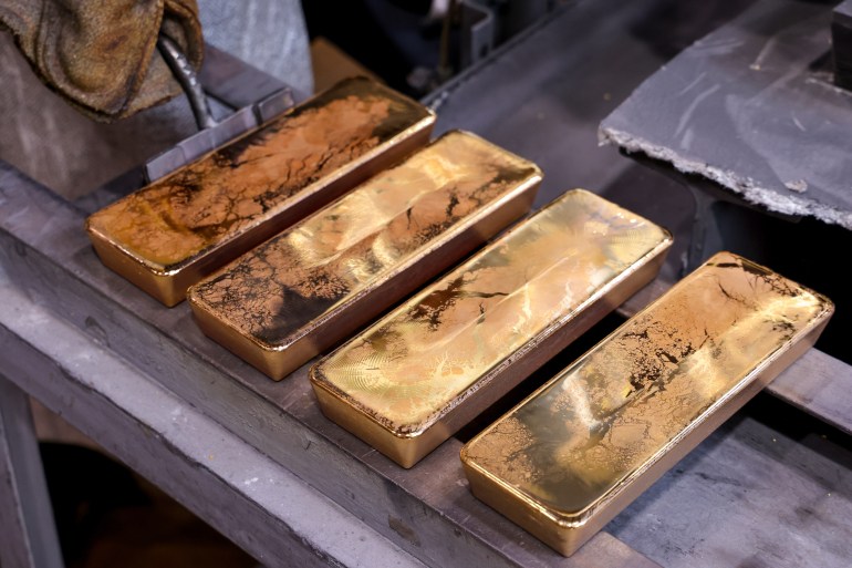 A row of gold ingots in a foundry. Photographer: Andrey Rudakov/Bloomberg