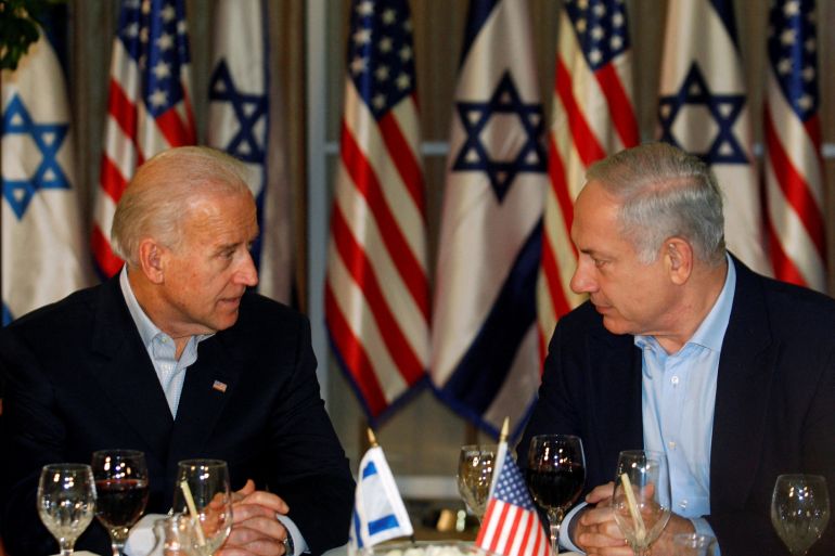 FILE PHOTO: U.S. Vice President Joe Biden sits with Israel's Prime Minister Benjamin Netanyahu (R) before a dinner at the Prime Minister's residence in Jerusalem March 9, 2010. REUTERS/Baz Ratner (JERUSALEM - Tags: POLITICS)/File Photo