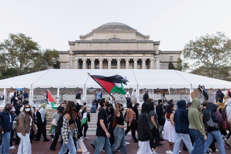 Pro-Palestinian students take part in a protest in support of the Palestinians amid the ongoing conflict in Gaza, at Columbia University in New York City, U.S., October 12, 2023. REUTERS/Jeenah Moon