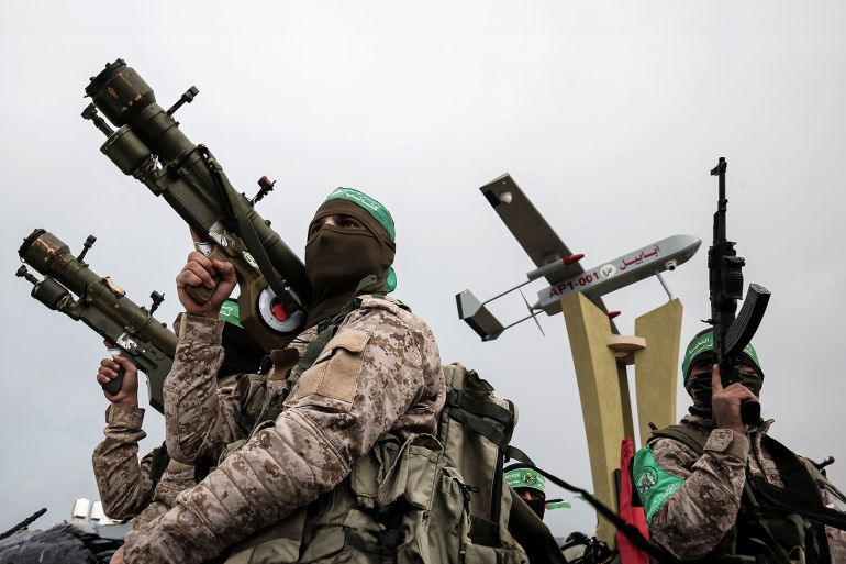 Members of the Ezzedine al-Qassam Brigades, the military wing of the Palestinian Islamist movement Hamas, attend a memorial in the southern Gaza Strip town of Rafah (File Photo: Said Khatib/AFP)