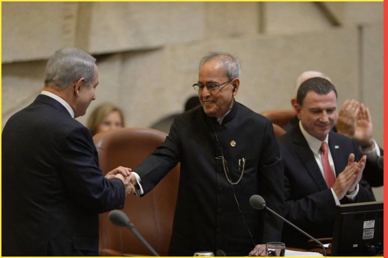 JERUSALEM, ISRAEL - OCTOBER 14: (ISRAEL OUT) In this handout from the Israeli Government Press Office (GPO), Prime Minister Benjamin Netanyahu (L) shakes hands with Indian President Pranab Mukherjee at the Knesset on October 14, 2015 in Jerusalem, Israel. Mukherjee is visiting Jordan, the Palestinian Authority and Israel during a six-day visit to the region. (Photo by Amos Ben-Gershom/GPO via Getty Images)