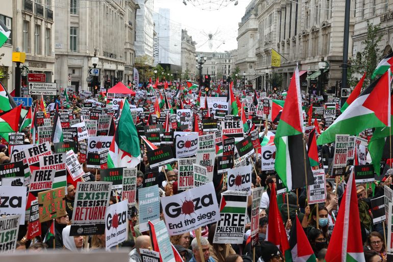 Demonstrators protest in solidarity with Palestinians, amid the ongoing conflict between Israel and the Palestinian Islamist group Hamas, in London, Britain, October 14, 2023. REUTERS/Toby Melville
