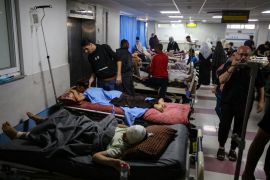 EDITORS NOTE: Graphic content / Injured people receive medical care at the emergency ward of the Al-Shifa hospital following an Israeli strike, in Gaza City on November 5, 2023. - Thousands of civilians, both Palestinians and Israelis, have died since October 7, 2023, after Palestinian Hamas militants based in the Gaza Strip entered southern Israel in an unprecedented attack triggering a war declared by Israel on Hamas with retaliatory bombings on Gaza. (Photo by Bashar TALEB / AFP)