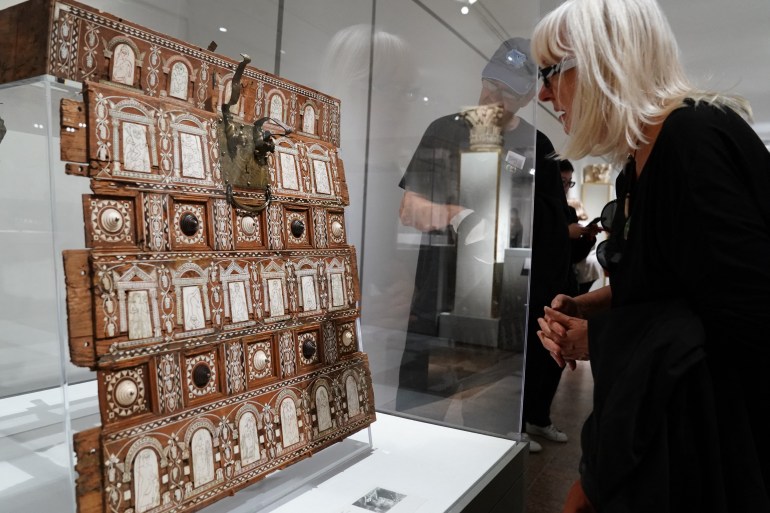 (FILES) Visitors look at "Bridal Chest," while touring the "Africa & Byzantium" exhibit during a press preview at The Metropolitan Museum of Art in New York on November 16, 2023. - Frescoes, mosaics, paintings, ironwork, jewelry, ceramics and manuscripts from the fourth to the fifteenth centuries: the Metropolitan Museum of Art in New York is presenting 200 works of ancient and medieval art starting on November 19, 2023, that bear witness to a thousand years of influence of the Byzantine Empire on the Christian communities of Africa. Bringing together artistic, religious, literary and archaeological treasures, "Africa & Byzantium" shows the influence of the Byzantine Empire, heir to the Eastern Roman Empire, from its capital Constantinople (formerly Byzantium), on Christianity in the Horn of Africa from the fourth to the seventh centuries, according to a statement from the Met. (Photo by Bryan R. Smith / AFP)