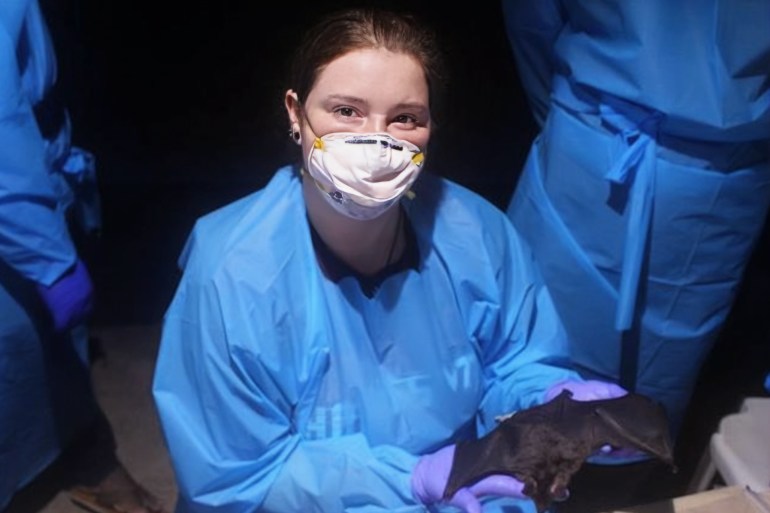 Paige Van de Vuurst poses with a vampire bat during field research in Colombia. (Paige Van de Vuurst/Virginia Tech)
