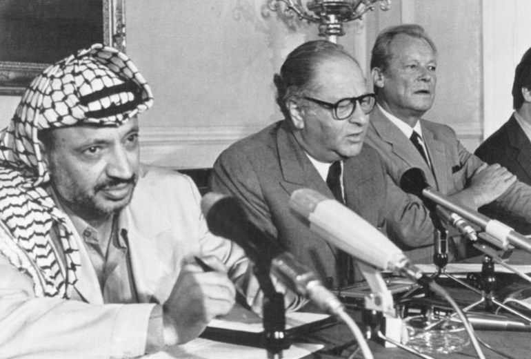 (Original Caption) Vienna: PLO leader, Jasir Arafat, with Austrian chancellor, Bruno Kreisky and Willy Brandt, chairman of Socialist Internationale at a press conference Sunday after two days of talks on the Middle East situation. The discussions are said to have been useful.