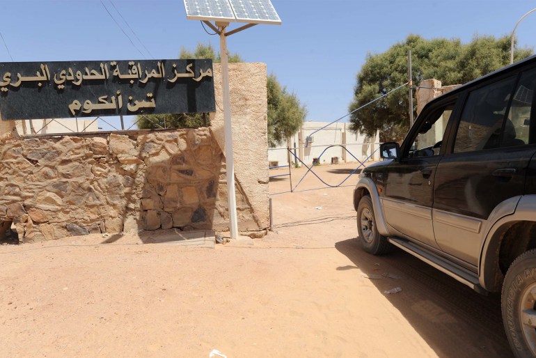 A vehicle sits on September 1, 2011 at the Libyan border post of Tinalkoum, some 220 kilometers south of Djanet where supposedly, members of ousted strongman Moamer Kadhafi's family crossed the frontier last week. Fallen Libyan dictator Moamer Kadhafi has attempted to negotiate with Algerian authorities to enter the country from a border town he is staying in, the El-Watan daily reported in its on-line edition on August 31. According to the Algerian press today, all border posts with Libya are now closed. AFP PHOTO FAROUK BATICHE / AFP PHOTO / FAROUK BATICHE