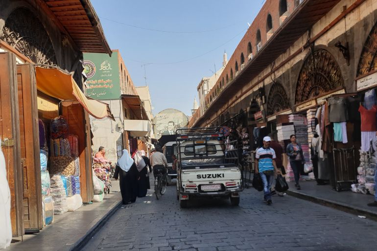 لقطة عامة من سوق الحريقة في دمشق- أرشيف الجزيرة والمراسلة