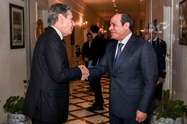 A handout picture released by the Egyptian Presidency shows Egyptian president Abdel Fattah al-Sisi (R) meeting with US Secretary of State Antony Blinken in Cairo at the Ittihadia presidential Palace on January 11, 2024. Blinken arrived in Cairo on January 11, for the final leg of a regional tour aimed at averting the spread of the Israel-Hamas war. (Photo by Egyptian Presidency / AFP) /
