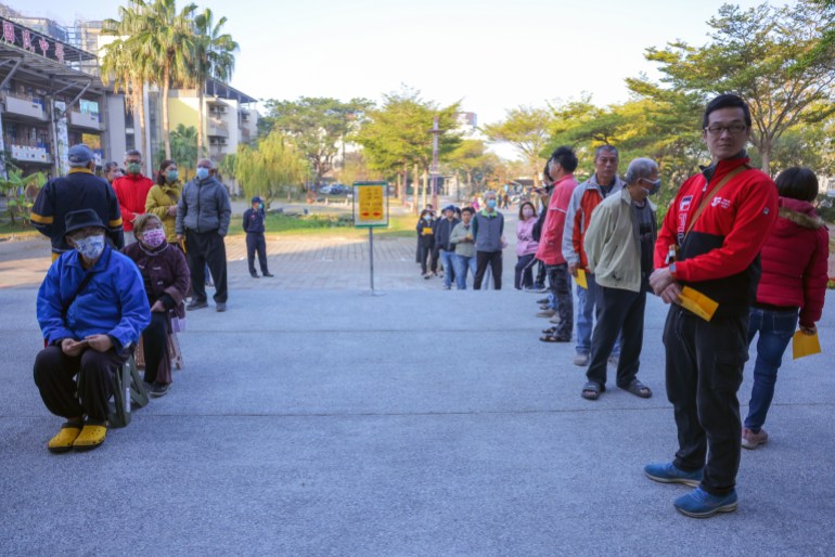 TAINAN, TAIWAN - JANUARY 13: Voters line up to cast their votes in the presidential election on January 13, 2024 in Tainan, Taiwan. Taiwan will vote in a general election in January.  On the 13th, this will have a direct impact on cross-strait relations.  (Photo by Annabelle Chi/Getty Images)