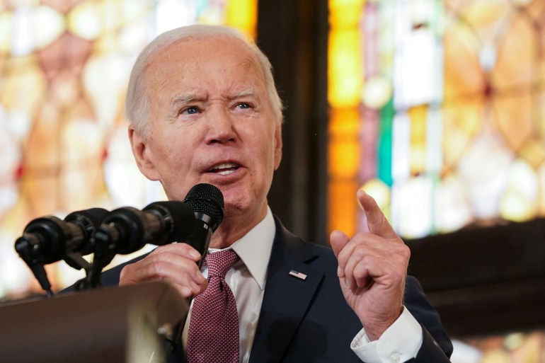 U.S. President Joe Biden gestures as he delivers a speech during a campaign event at the Mother Emanuel AME Church, the site of the 2015 mass shooting, in Charleston, South Carolina, U.S., January 8, 2024. REUTERS/Kevin Lamarque