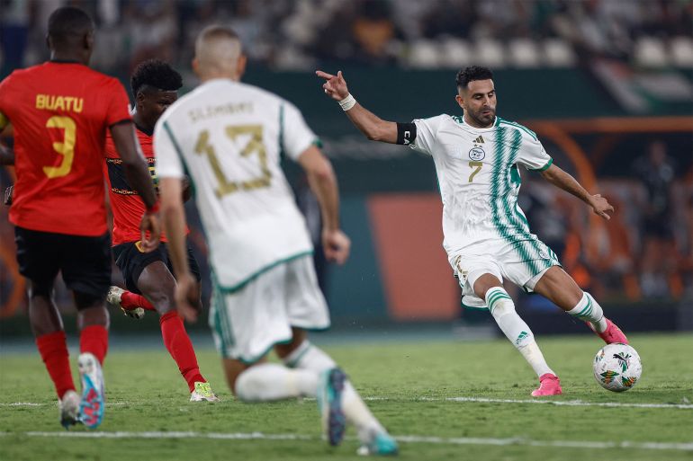 Algeria's forward #7 Riyad Mahrez shoots but fails to score during the Africa Cup of Nations (CAN) 2024 group D football match between Algeria and Angola at Stade de la Paix in Bouake on January 15, 2024. (Photo by KENZO TRIBOUILLARD / AFP)