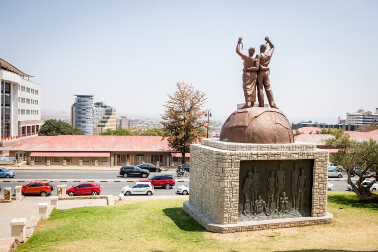 Genocide Monument near Alte Feste and city panorama in Windhoek, Namibia. September 2016