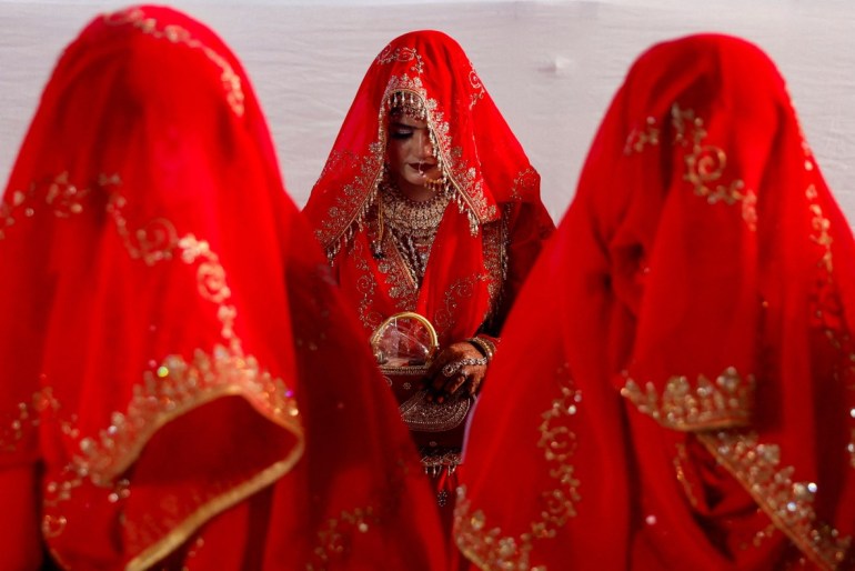 Muslim women are seen during a mass marriage ceremony, in which, 51 Muslim couples took their wedding vows, in Mumbai, India, January 14, 2024. PHOTO: REUTERS