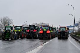 CHILLY-MAZARIN, FRANCE - FEBRUARY 1: Protesting farmers blockade the A10 highway with tractors on February 1, 2024 in Chilly-Mazarin, France. French farmers choked off main highways around Paris as of January 29 after threatening to blockade the capital in an ongoing stand-off with the government over work conditions, taxes and regulation. Several farmers have been arrested as tractors edged close to Paris and the main food hall of the capital. (Photo by Christian Liewig - Corbis/Getty Images)