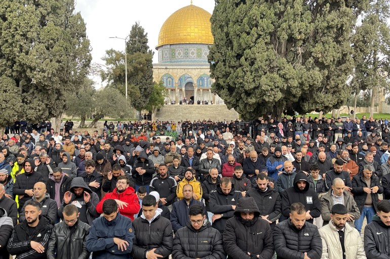 JERUSALEM - FEBRUARY 16: Palestinians perform Friday prayers near the Dome of the Rock of Masjid Al-Aqsa as the Israeli forces continue to impose restrictions during the 19th week in Jerusalem on February 16, 2024. (Photo by Mohammad Hamad/Anadolu via Getty Images)
