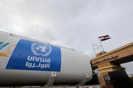 FILE PHOTO: A truck, marked with United Nations Relief and Works Agency (UNRWA) logo, crosses into Egypt from Gaza, at the Rafah border crossing between Egypt and the Gaza Strip, during a temporary truce between Hamas and Israel, in Rafah, Egypt, November 27, 2023. REUTERS/Amr Abdallah Dalsh/File Photo/File Photo