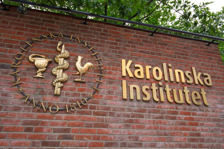 Signage of Karolinska Institutet, Stockholm, Sweden - 20 Jun 2018: It is recognised as Sweden's best ...
