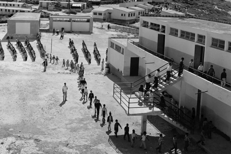 Students line up before a preparatory school for an orderly entrance into their classroom in Nabatieh camp, Lebanon. VC 1969 UNRWA Archive Photographer