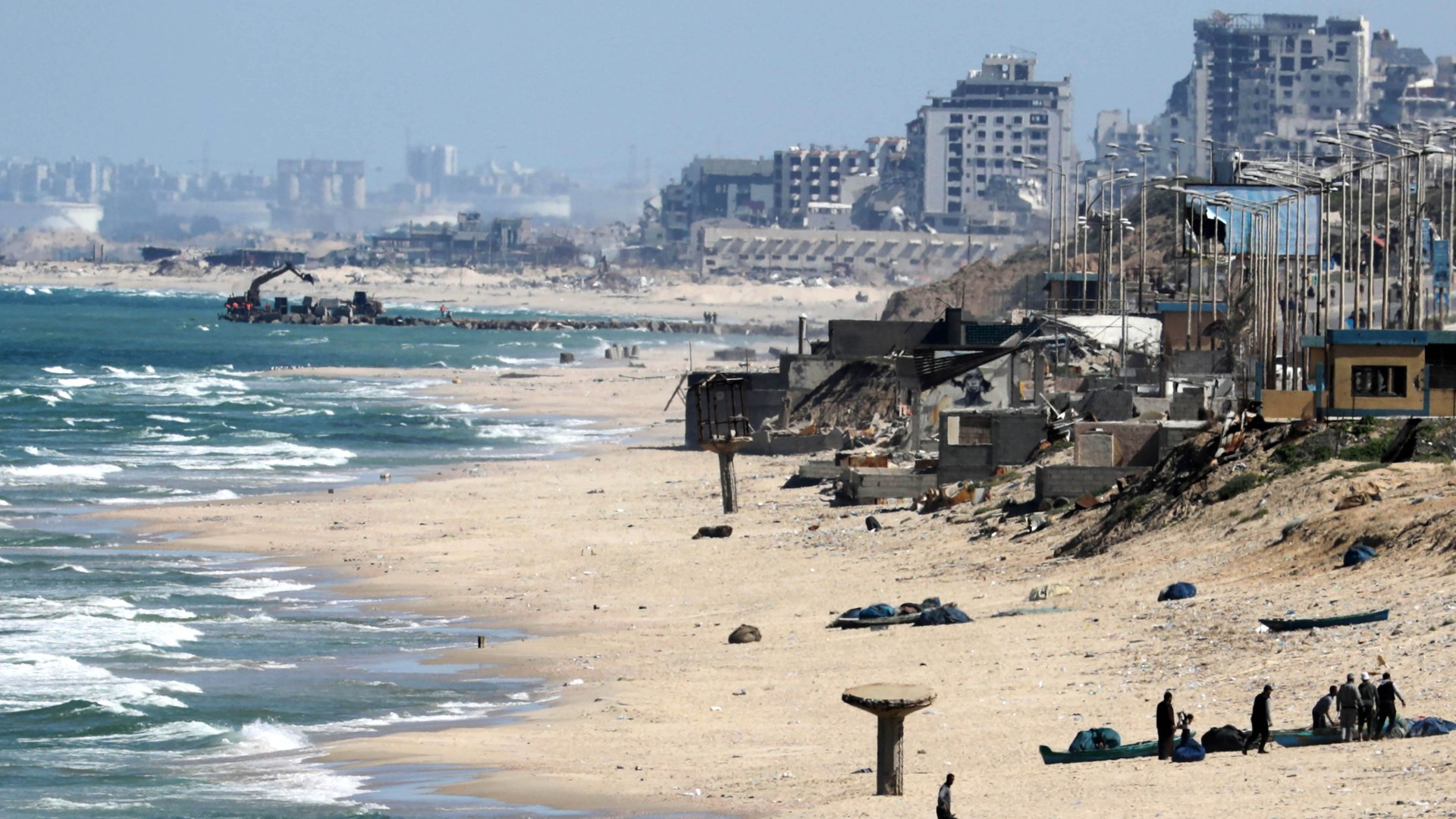 الميناء الأميركي.. رصيف يُشيّد بركام غزة وأشلاء شهدائها | أخبار | الجزيرة نت