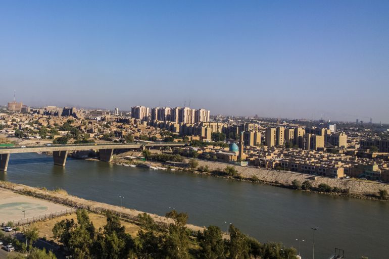 Aerial photographs of the city of Baghdad ,And shows where residential complexes and the Tigris River and bridges. The city of Baghdad, capital of Iraq, one of the oldest Arab capitals.