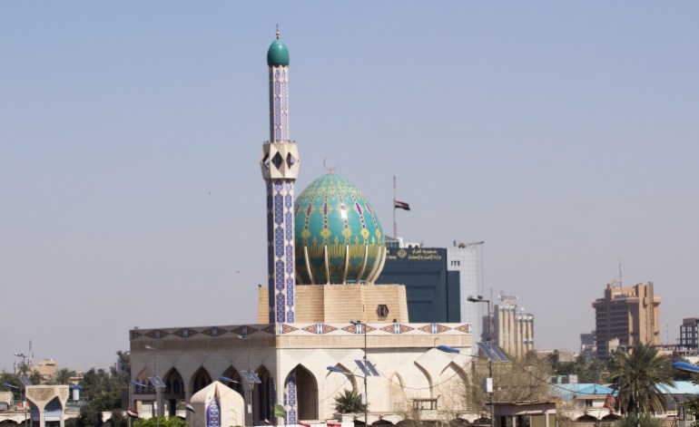 Picture of mosque of Haji Beuneha In Al Alawi In the city center of Baghdad, And behind the building of the Ministry of housing and construction.