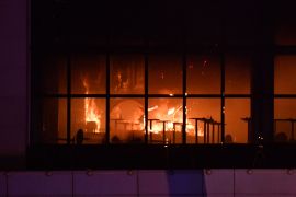 منظر يظهر قاعة الحفلات الموسيقية المحترقة بعد حادث إطلاق النار في كراسنوغورسك، خارج موسكو (الفرنسية)