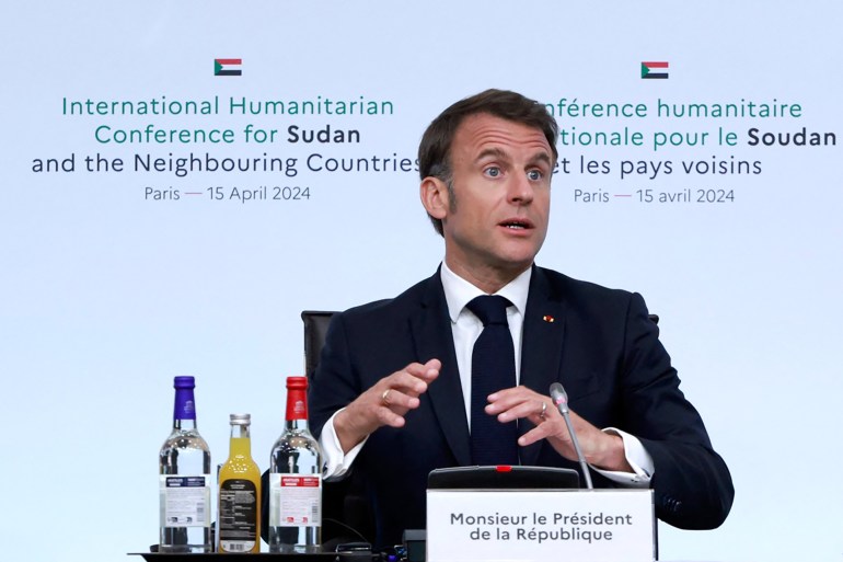 France's President Emmanuel Macron speaks as he chairs an international conference to address Sudan's "forgotten" war, in Paris, on April 15, 2024. - France and its allies on April 15, sought to drum up hundreds of millions in aid for Sudan a year since the civil war erupted, sparking one of the world's worst and most under-funded humanitarian crises. (Photo by Aurelien Morissard / POOL / AFP)