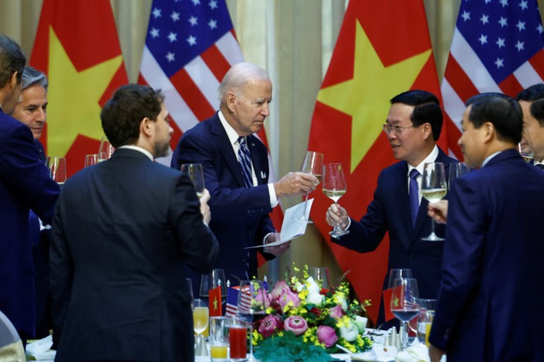 US President Joe Biden raises a toast with Vietnamese President Vo Van Thuong in Hanoi, Vietnam, on September 11, 2023, after the two countries and one-time enemies elevated diplomatic and trade relations to their highest level [Evelyn Hockstein/Reuters]