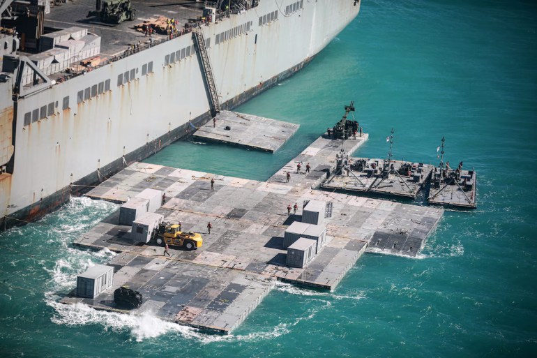 A photo released by the U.S. Army shows soldiers construct a floating causeway off the coast of Bowen, Australia, in 2023. (Getty Images)