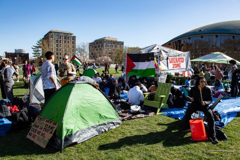 Pro-Palestinian supporters from Harvard University and the Massachusetts Institute of Technology (MIT) rally at MIT at an encampment for Palestine at MIT in Cambridge, Massachusetts, on April 22, 2024. (Photo by Joseph Prezioso / AFP)