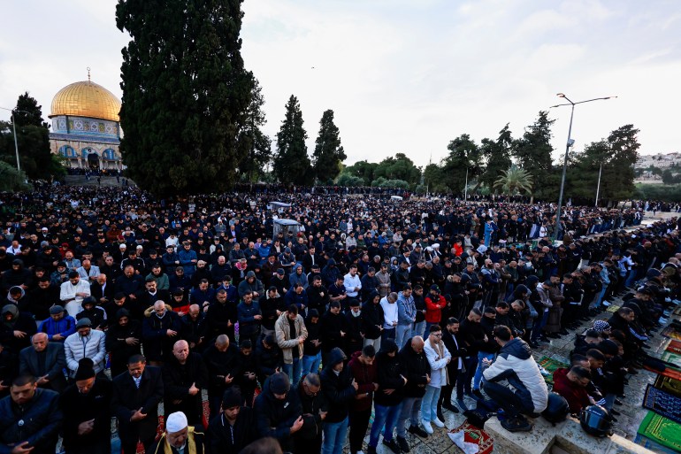 Muslims attend Eid al-Fitr prayers which mark the end of Ramadan, in Al-Aqsa compound, also known to Jews as Temple Mount, amid the ongoing conflict in Gaza between Israel and Palestinian Islamist group Hamas, in Jerusalem's Old City April 10, 2024. REUTERS/Ammar Awad