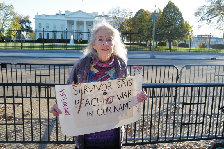Washington, DC – November 15, 2023: Activist and Holocaust survivor, Marione Ingram, 87 holds a sign while demonstrating daily at the white House calling for "peace not war in our name."; Shutterstock ID 2389164311; purchase_order: AJA; job: ; client: ; other: