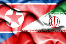 عَلما إيران (يمين) وكوريا الشمالية (شترستوك)