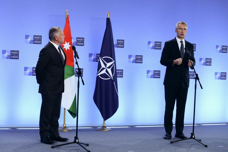 NATO Secretary General Jens Stoltenberg (R) speaks during a joint news conference with Jordan's King Abdullah II ibn Al Hussein (L) at the Nato Alliance's headquarters in Brussels, on May 5, 2021. (Photo by JOHANNA GERON / POOL / AFP)