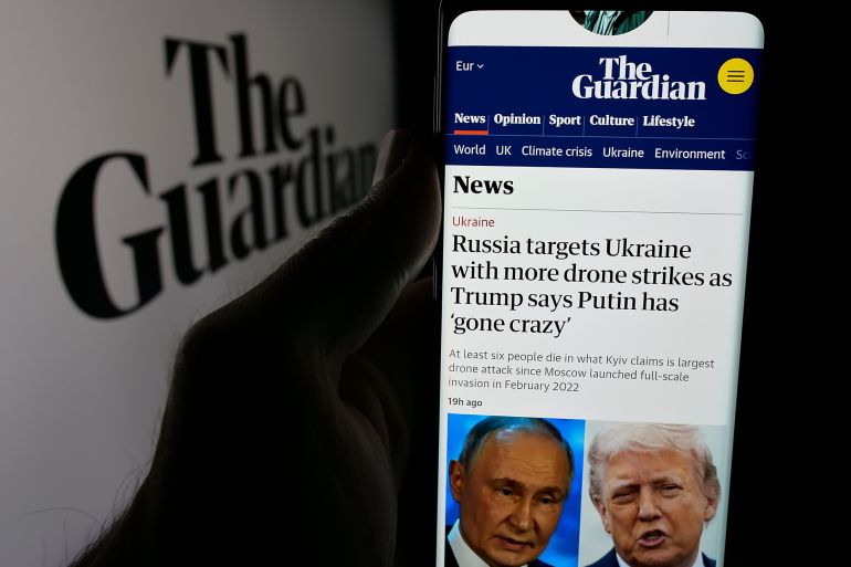 Stuttgart, Germany - 05-27-2025: Person holding smartphone with web page of British newspaper company The Guardian on screen in front of logo. Focus on center of phone display. Unmodified photo.; Shutterstock ID 2637860747; purchase_order: AJA; job: ; client: ; other: