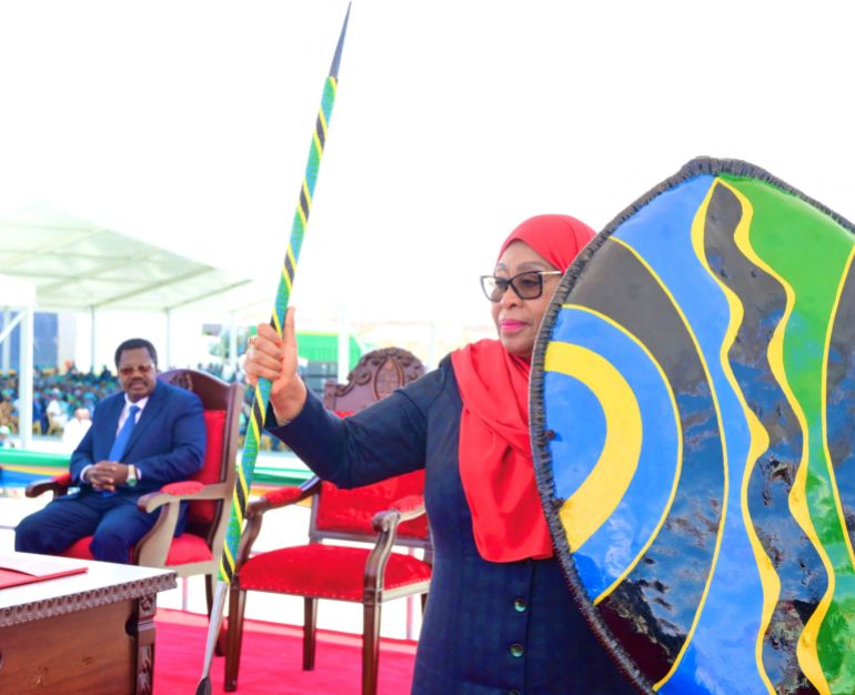 Tanzania's President Samia Suluhu Hassan holds a spear and a shield during her swearing-in ceremony in Dodoma, Tanzania November 3, 2025. Tanzania Presidential Press Unit/Handout via REUTERS THIS IMAGE HAS BEEN SUPPLIED BY A THIRD PARTY