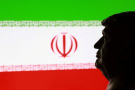 FILE PHOTO: A 3D printed miniature of U.S. President Donald Trump and Iranian flag are seen in this illustration taken January 9, 2026. REUTERS/Dado Ruvic/Illustration/File Photo