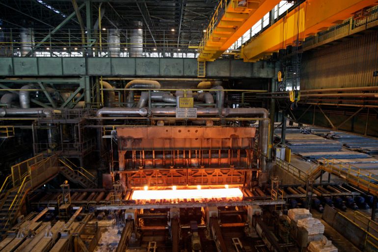 FILE - In this May 31, 2012 file photo, a furnace of the Mobarakeh Steel Complex is seen, some 280 miles (460 kilometers) south of the capital Tehran, and some 40 miles, 65 kilometers, southwest of central Iranian city of Isfahan. President Donald Trump ordered new sanctions on Iran Wednesday targeting Iran's steel, aluminum, copper and iron sectors, which provide foreign currency earnings for the nation's sagging economy. (AP Photo/Vahid Salemi, File)