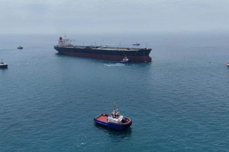 FILE PHOTO: Drone view of oil tanker HELGA berthed at one of Iraq's southern offshore oil terminals near Basra as it prepares to load crude oil, becoming the second vessel to arrive since the closure of the Strait of Hormuz, April 24, 2026. REUTERS/Mohammed Aty/File Photo