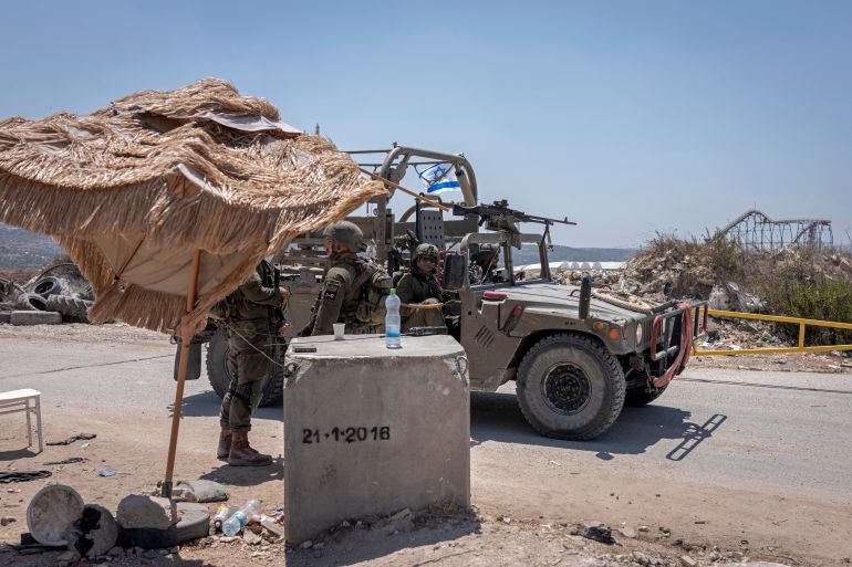 Israeli security personnel patrol along the mainroad between Jenin and the newly reopened settlement of Ganim in the Israeli-occupied West Bank on August 13, 2026.
