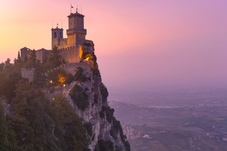 Guaita fortress or Prima Torre on the ridge of Mount Titano, in the city of San Marino of the Republic of San Marino at sunset