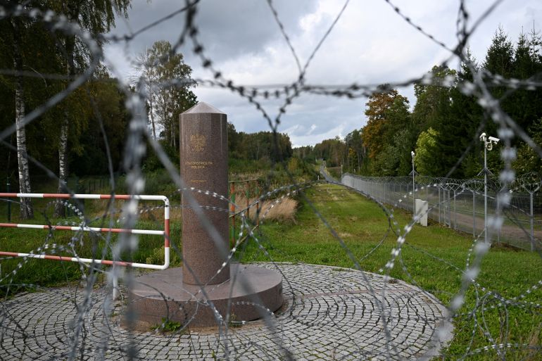A razor-wire boundary fence is seen along the Polish-Lithuanian border with the Russian exclave of Kaliningrad near the village of Grzybina, Podlaskie Voivodeship, near the Suwalki Gap on September 26, 2026.