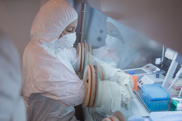 In this undated handout picture released by the Irkutsk Antiplague Research Institute, a specialist works in a laboratory as part of anti-epidemic measures during the 2019 Winter Universiade in Krasnoyarsk. (Photo by Handout / Irkutsk Antiplague Research Institute / AFP) / RESTRICTED TO EDITORIAL USE - MANDATORY CREDIT "AFP PHOTO / IRKUTSK ANTIPLAGUE RESEARCH INSTITUTE" - HANDOUT - NO MARKETING NO ADVERTISING CAMPAIGNS - DISTRIBUTED AS A SERVICE TO CLIENTS