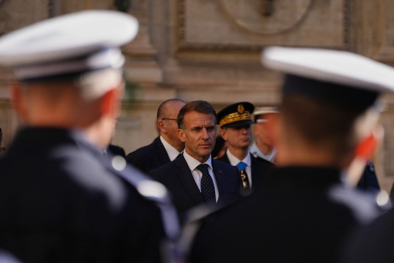 French President Emmanuel Macron (C) meets with police forces at the prefecture in Marseille, southern France, on October 26, 2026.