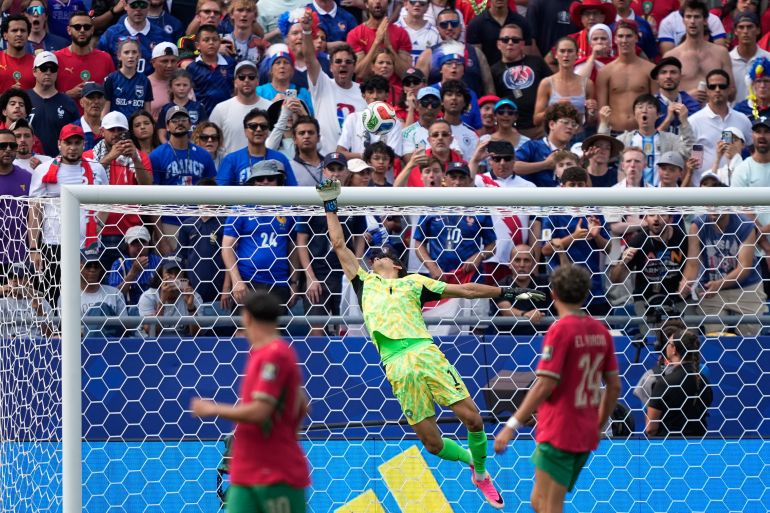 Morocco goalkeeper Yassine Bounou leaps for a save during the World Cup quarterfinal soccer match between France and Morocco in Foxborough, Mass., near Boston, Thursday, July 9, 2026. (AP Photo/Matt Slocum)