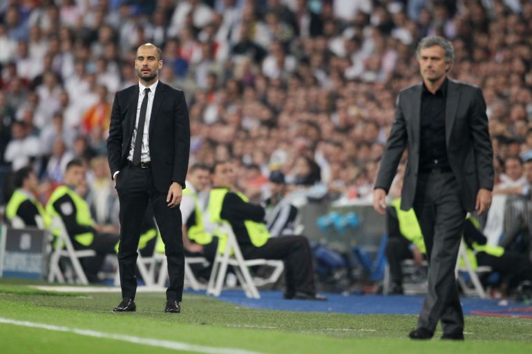 Football - Real Madrid v FC Barcelona - UEFA Champions League Semi Final First Leg - Estadio Santiago Bernabeu, Madrid - Spain - 10/11 , 27/4/11 Josep Guardiola - FC Barcelona Coach and Jose Mourinho - Real Madrid Coach Mandatory Credit: Action Images / Andrew Couldridge