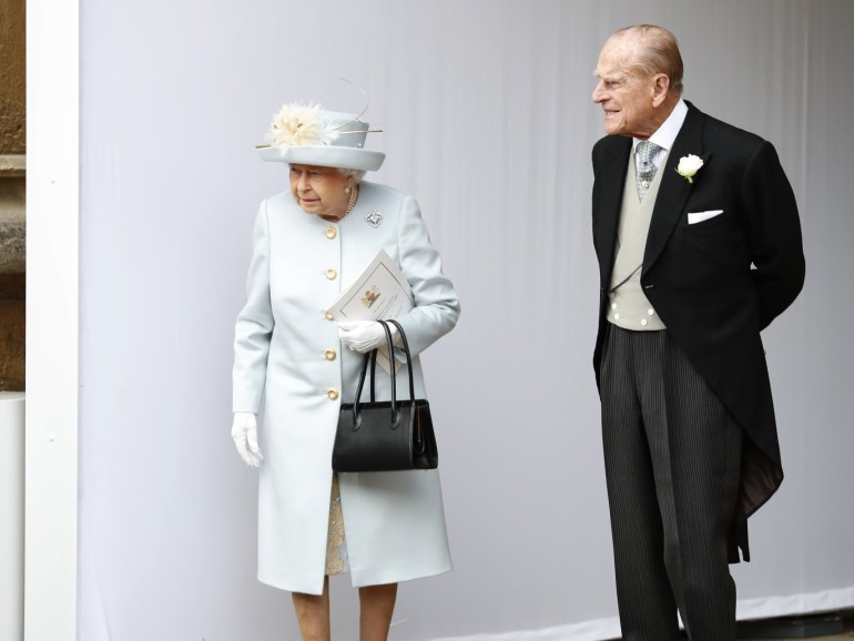 WINDSOR, ENGLAND - OCTOBER 12: Queen Elizabeth II and Prince Philip, Duke of Edinburgh look on after the wedding of Princess Eugenie of York and Mr. Jack Brooksbank at St. George's Chapel on October 12, 2018 in Windsor, England. (Photo by Alastair Grant - WPA Pool/Getty Images)
